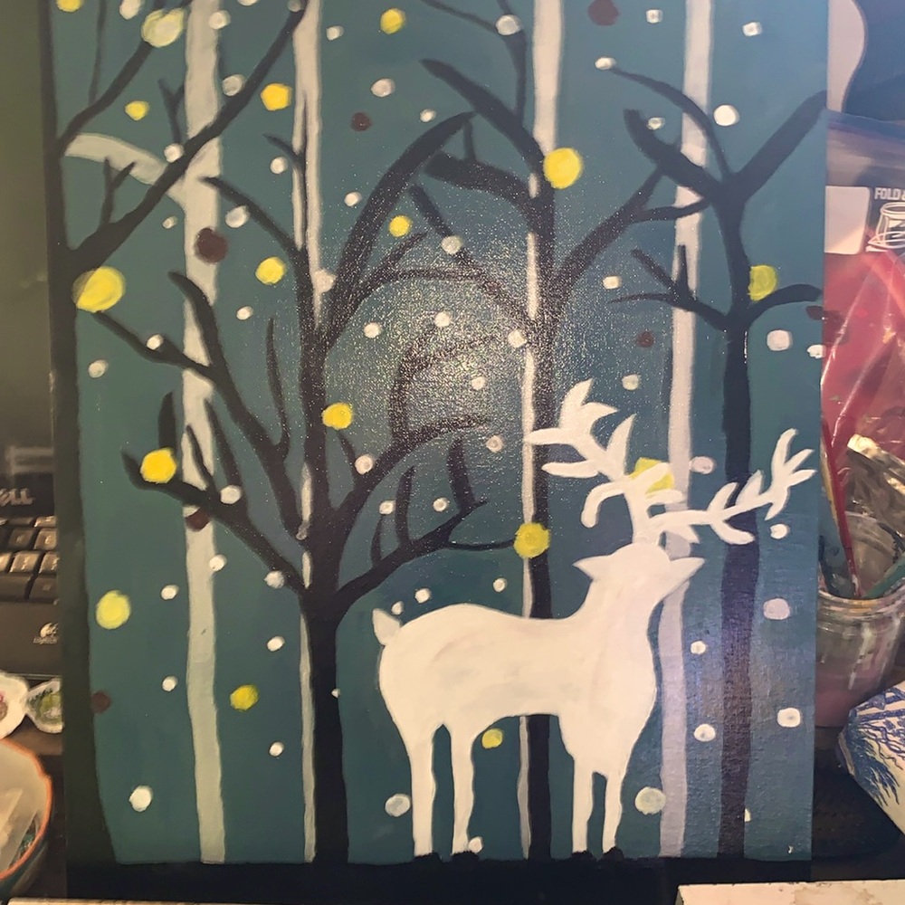 Painting of deer in snow lights